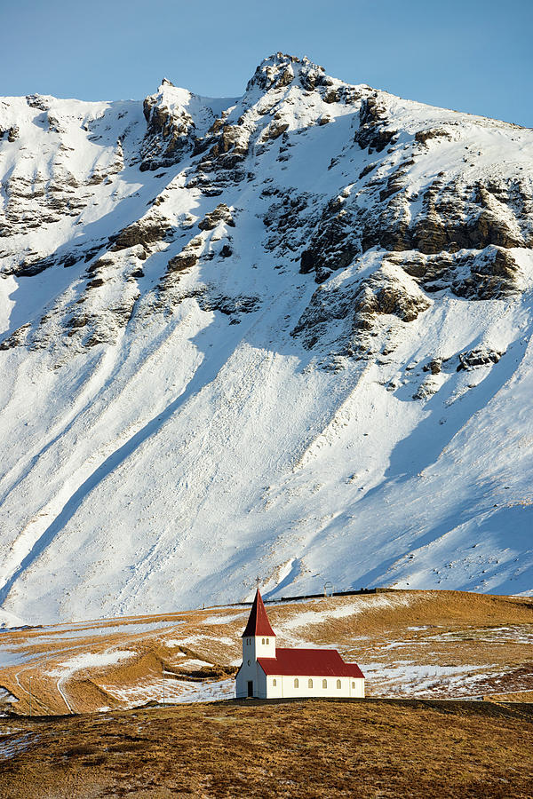 Church and mountains in winter Vik Iceland Photograph by Matthias Hauser
