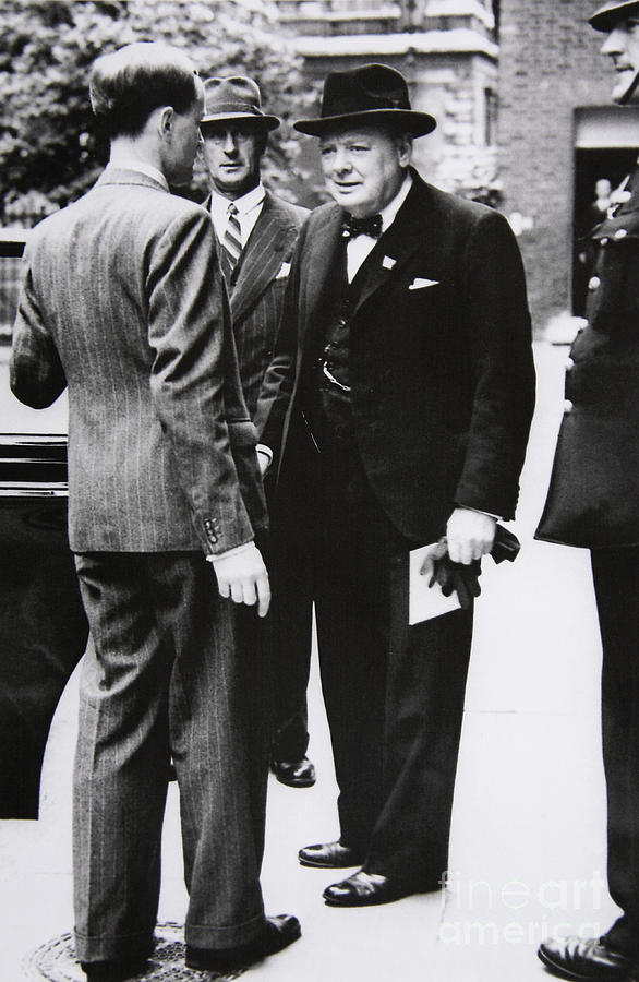 Churchill leaves Downing Street to take King George VI a letter from the US President, 1941 Photograph by English School