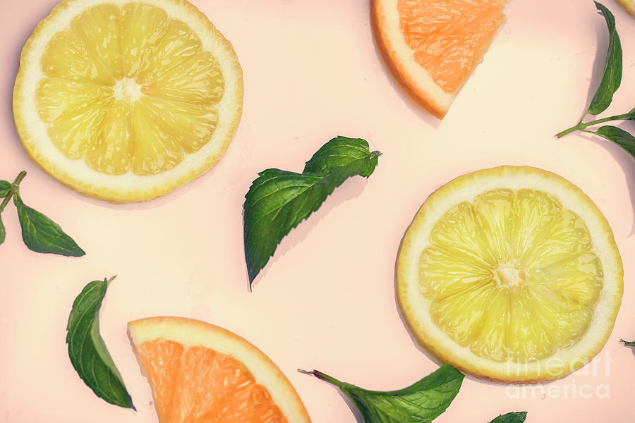 Citrus pattern on retro pink background Photograph by Jelena Jovanovic