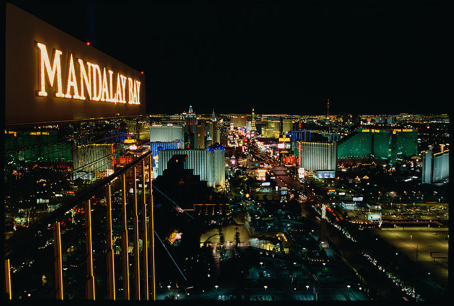 Architecture Photograph - City Lit Up At Night, Mandalay Bay by Panoramic Images