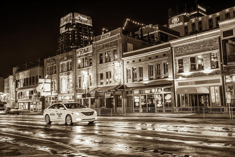 Nashville Photograph - City Nights Sepia - Neon Lights on Lower Broadway - Nashville Tennessee by Gregory Ballos