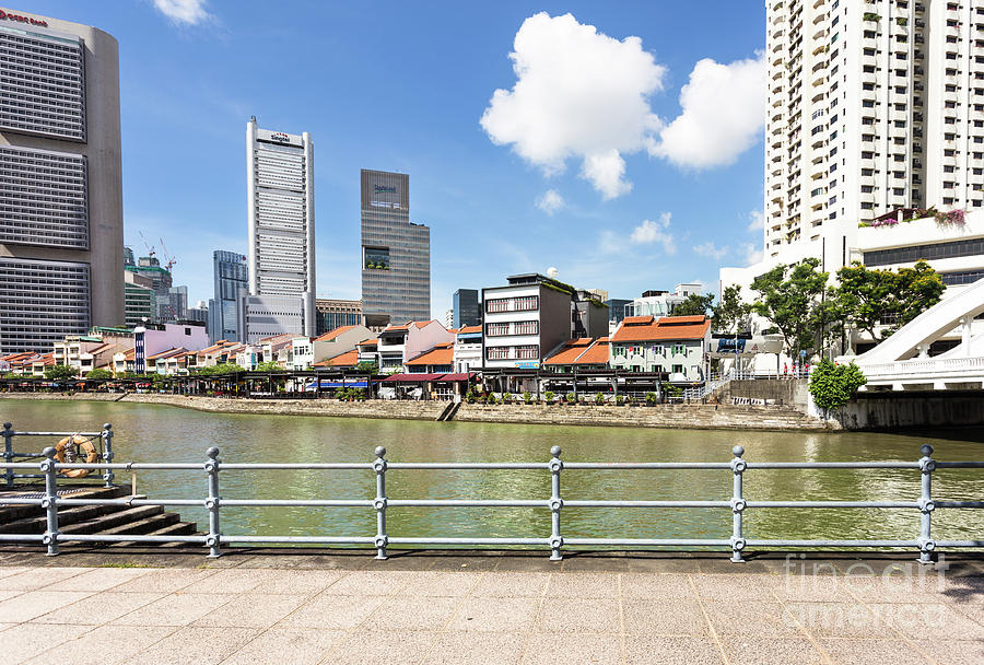 Clark Quay in Singapore on a sunny day along the river.  Photograph by Didier Marti