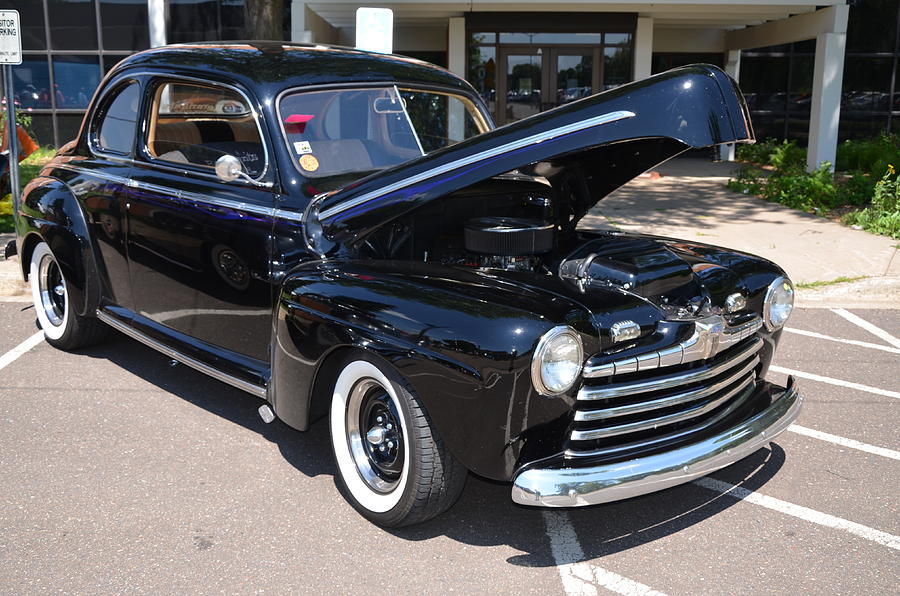 Classic Black Ford car Photograph by Jeelan Clark