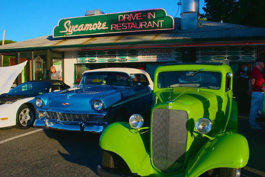 Classic Lime Green Car in front of the Sycamore Photograph by Polly Castor