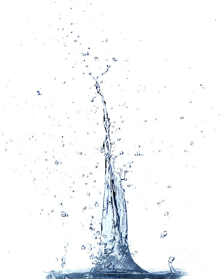 Clear water splashing. Isolated on white background. Photograph by Michal Bednarek