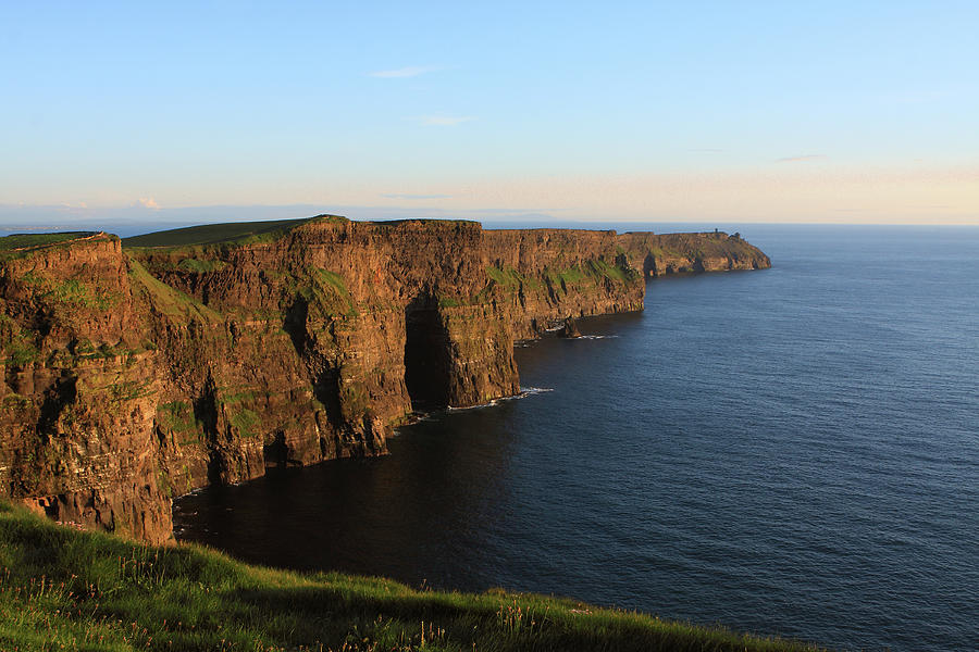 Cliffs Of Moher In County Clare At Sunset Photograph by Aidan Moran