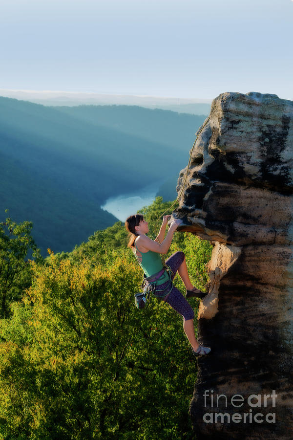 Climbing the rock Photograph by Dan Friend