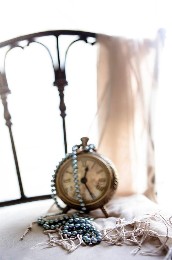 Clock and Pearls on chair Photograph by Rebecca Cozart