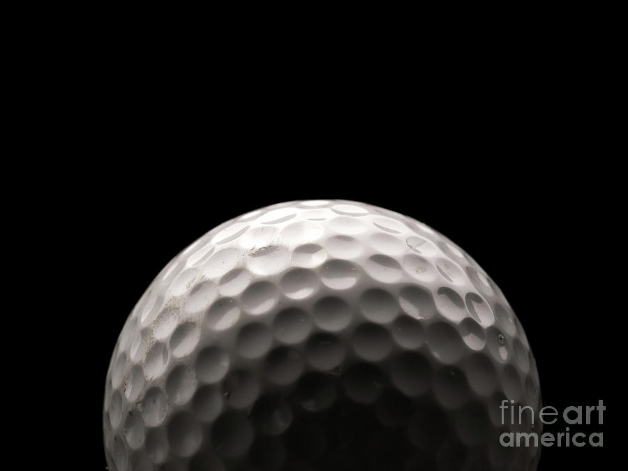 Close up of a golf ball Photograph by Andreas Berheide
