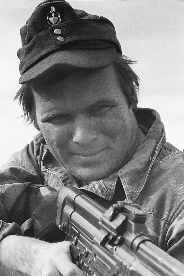 Close up of Barry Sadler shooting a machine gun Tucson Arizona 1971 Photograph by David Lee Guss