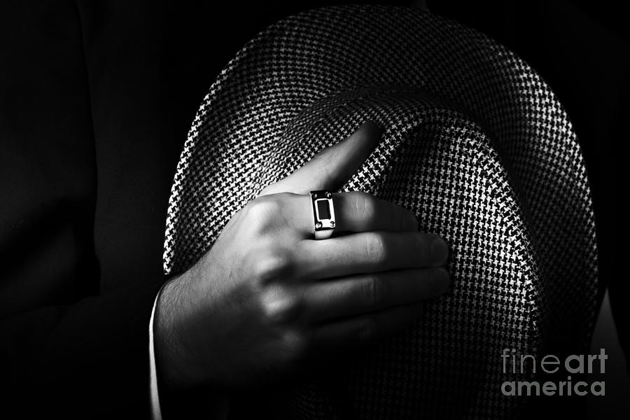 Close-up shot of a male ring hand holding hat Photograph by Jorgo Photography