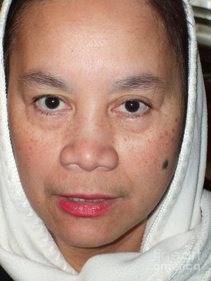Portrait Photograph - Closeup of a Filipina Woman with a Mole on Her Cheek and Wearing a Scarf by Jim Fitzpatrick