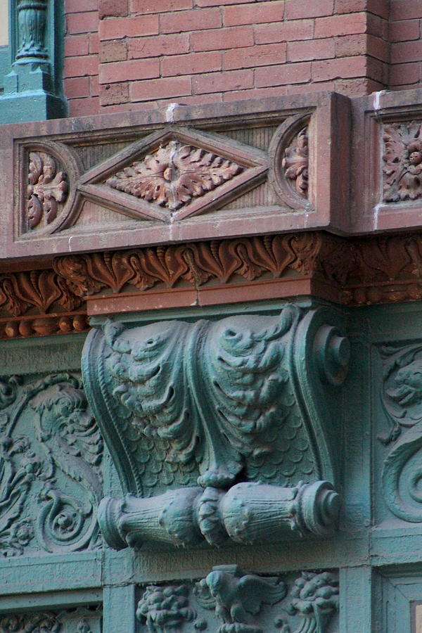 Closeup of Brick Building in Chicago with Green Ornament