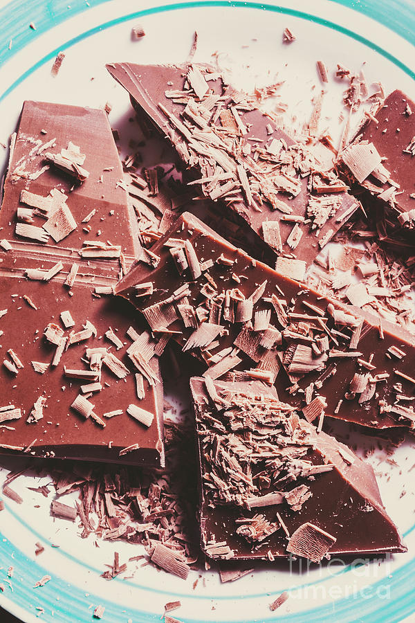 Candy Photograph - Closeup Of Chocolate Pieces And Shavings On Plate by Jorgo Photography