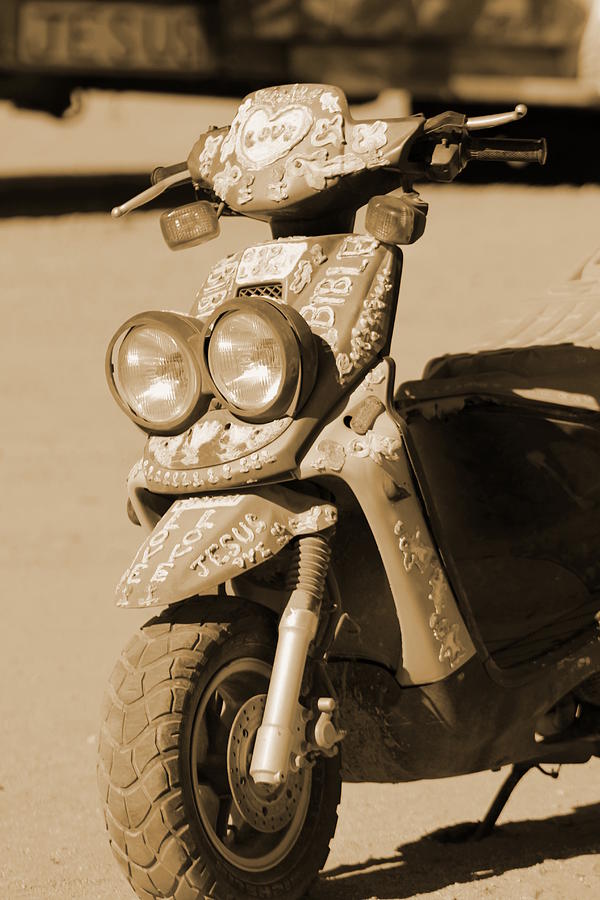 Closeup of Jesus Scooter in Sepia Photograph by Colleen Cornelius