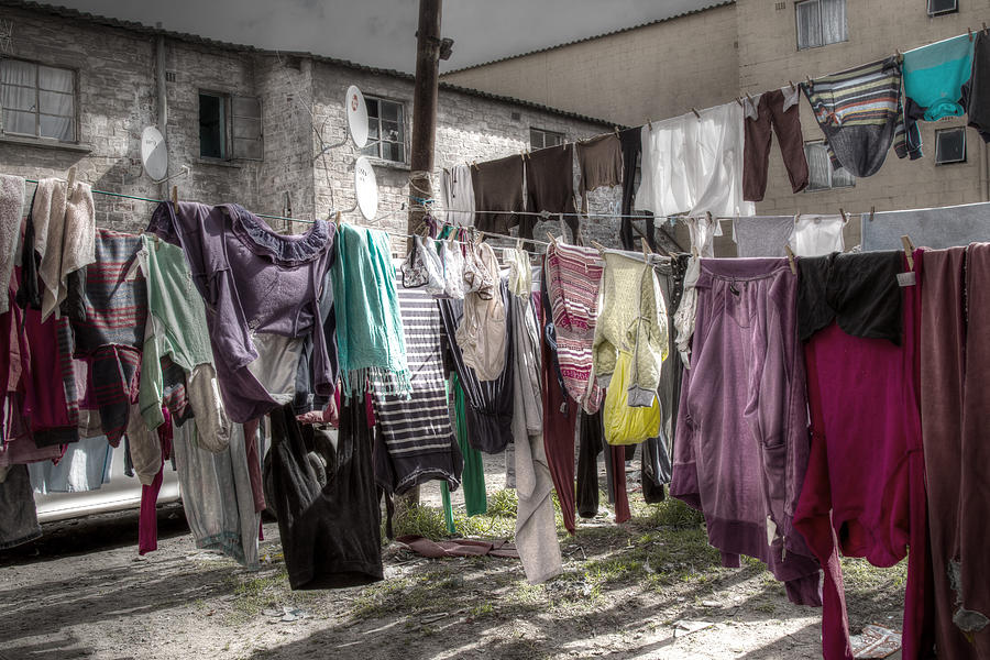 Clothes hanging Photograph by Claudio Maioli