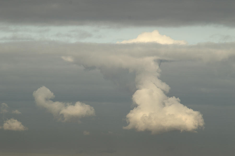 Cloud Breaks Through Cloud Photograph by Adrian Wale