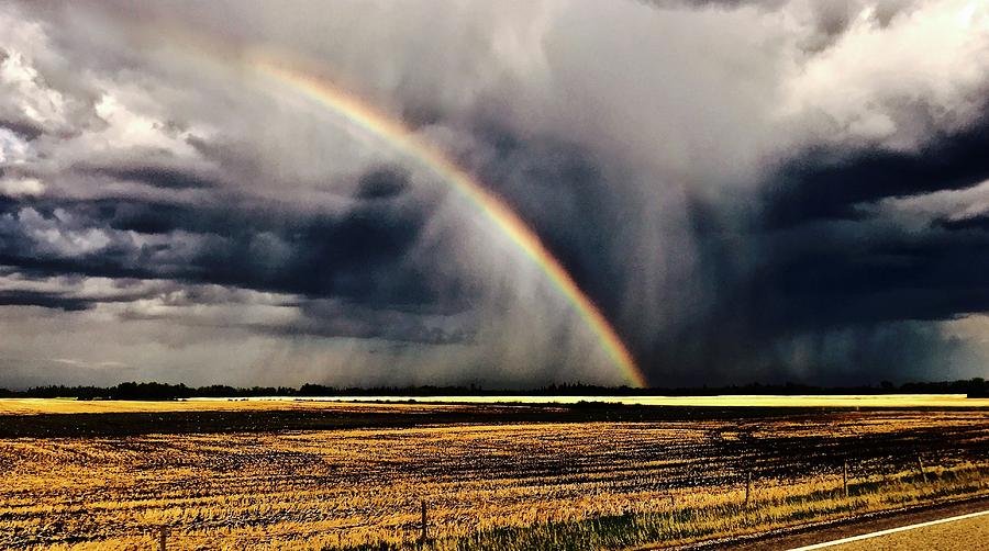 Cloud burst and Rainbow early Spring Storm Photograph by Brian Sereda