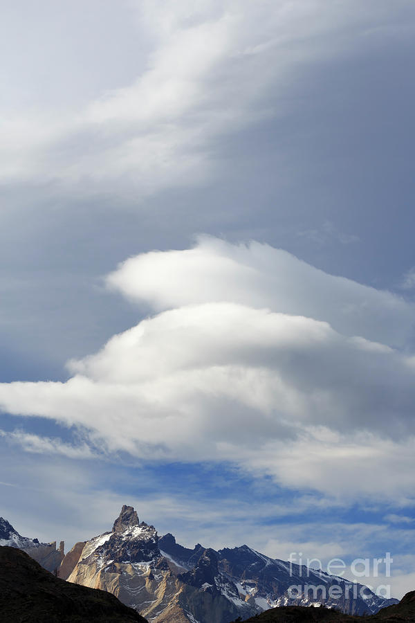 Mountain Photograph - Cloud formations above the mountains of Los Cuernos by Louise Heusinkveld