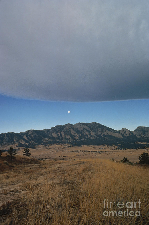 Cloud layer over Rocky Mountains Photograph by Henry Lansford