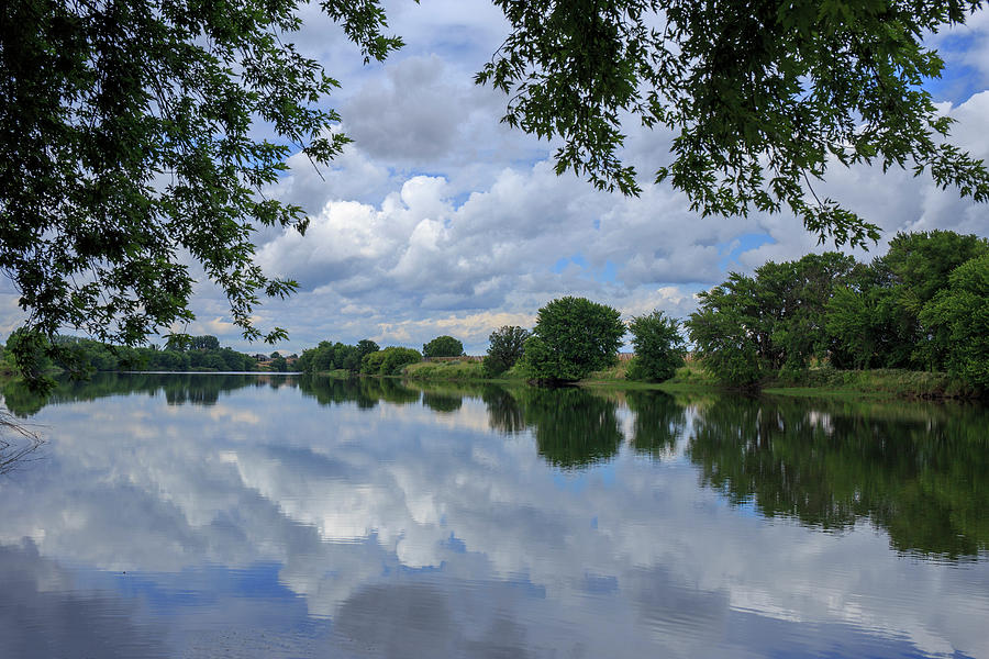Cloud reflections Photograph by Lynn Hopwood