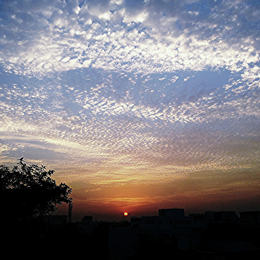 Nature Photograph - Cloud swirl at sunrise by Atullya N Srivastava