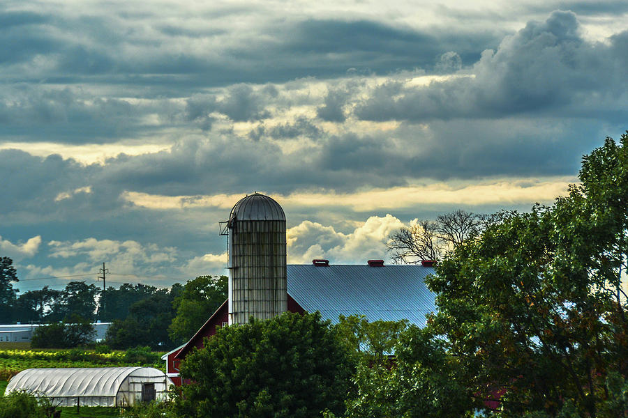 Clouds and Light on a Barn Photograph by Tana Reiff