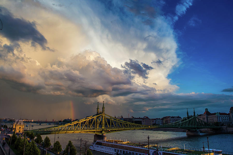 Clouds and Rainbow above the Danube Photograph by Judith Barath