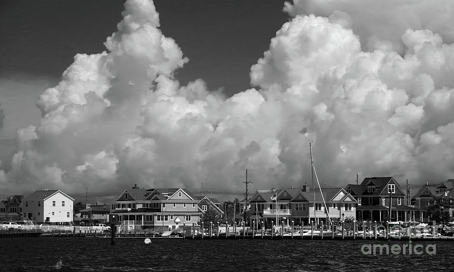Clouds and Shore Houses Photograph by Mary Haber