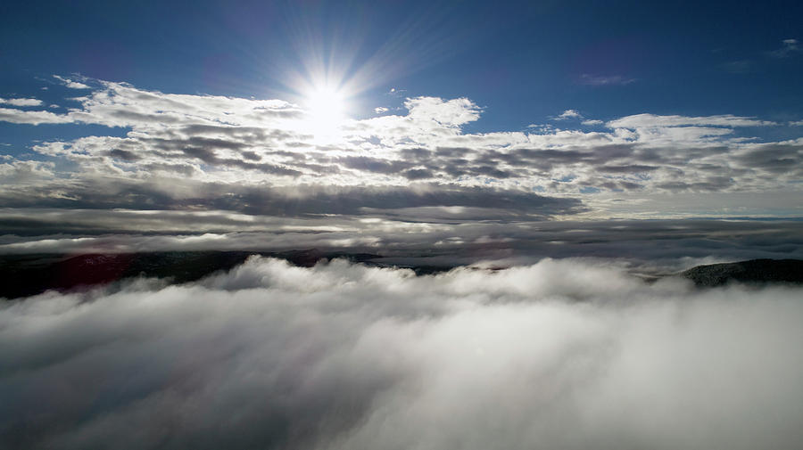 Clouds and Sun Photograph by Matt Swinden