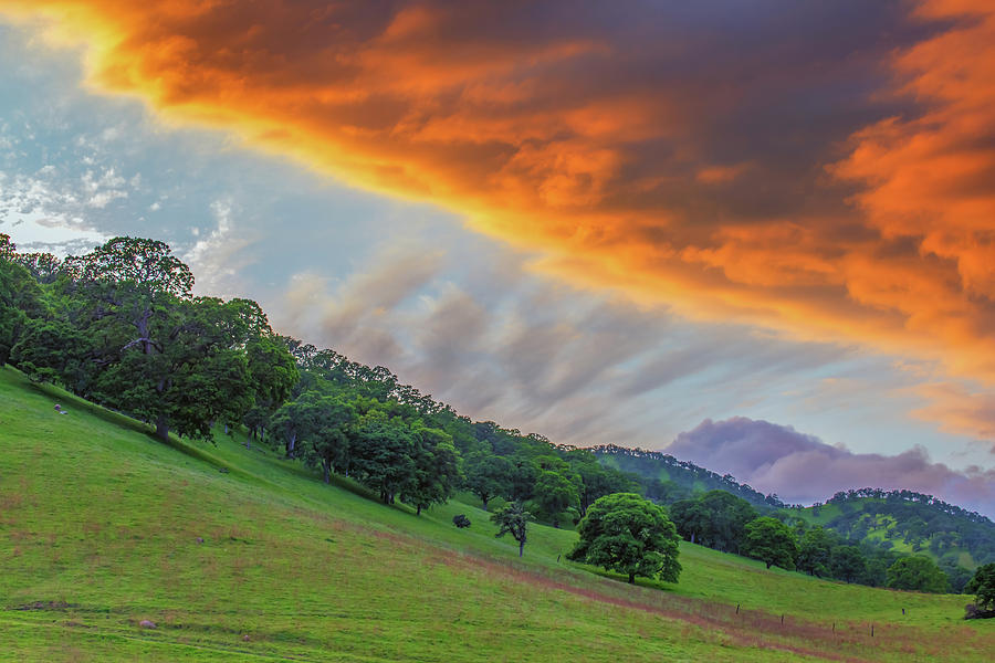 Clouds at Sunset Over Green Hills Photograph by Marc Crumpler