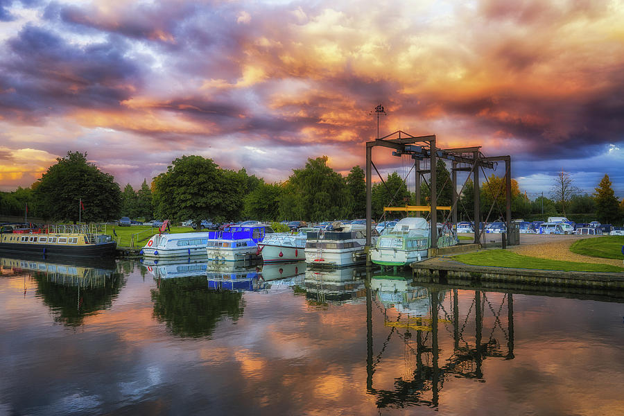 Clouds at sunset over the Ouse Photograph by James Billings