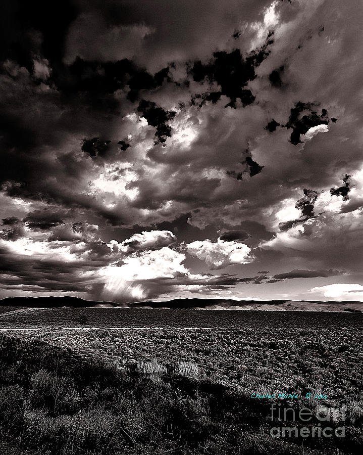 Clouds at sunset X Photograph by Charles Muhle