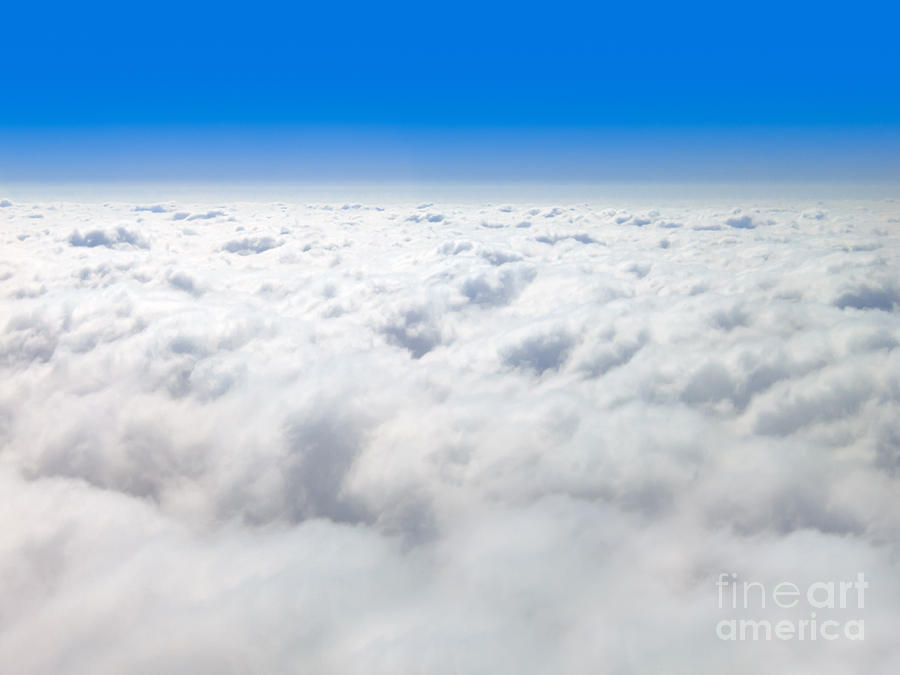 Nature Photograph - Clouds from Above and Blue Sky Horizon by Paul Velgos