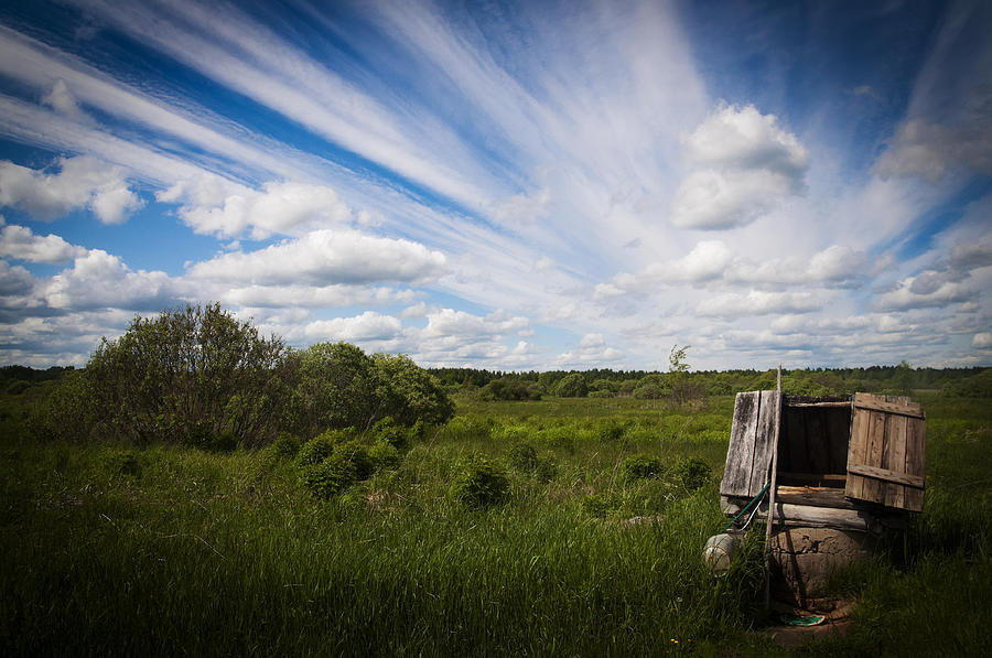 Landscape Photograph - Clouds, grass and water well by Elena Ivanova IvEA