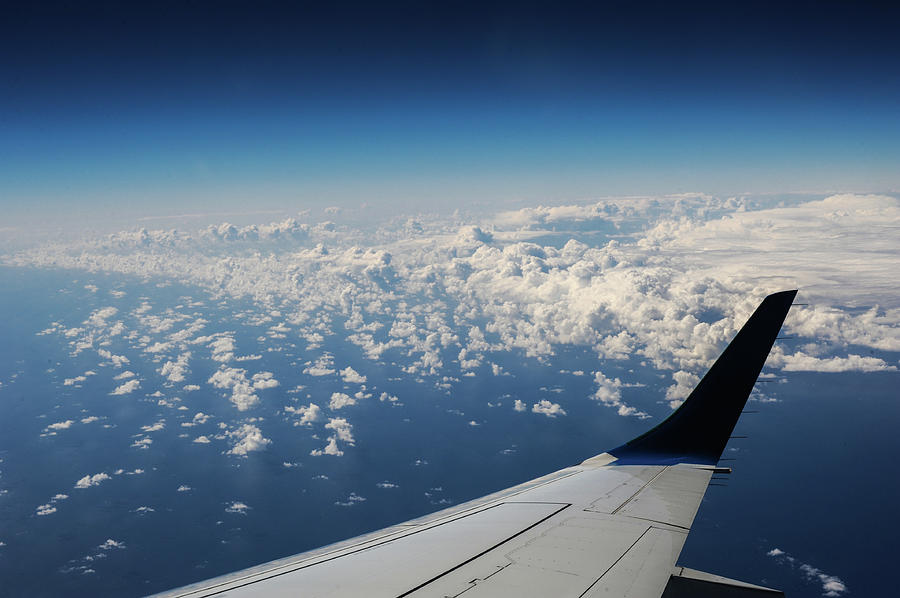 Clouds Under an Airplane Wing Photograph by Maksym Kaharlytskyi - Fine ...