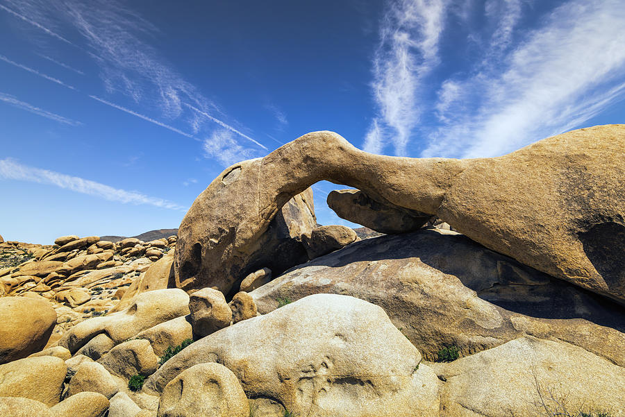 Clouds over Arch Rock Joshua Tree National Park Photograph by Joseph S Giacalone