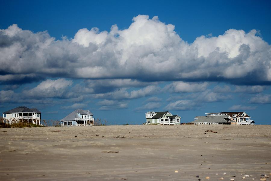 Nature Photograph - Clouds Over Beach Houses by Cynthia Guinn