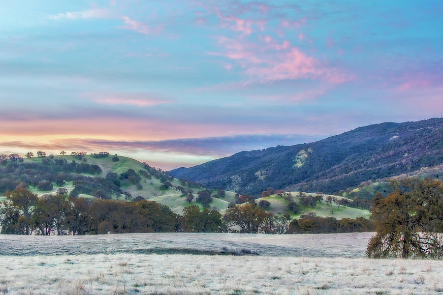 Clouds Over Frosty Landscape Photograph by Marc Crumpler