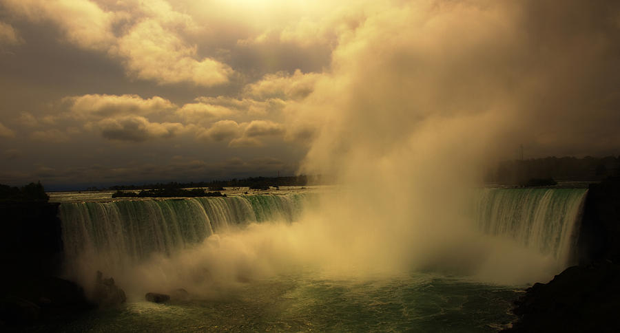 Clouds over Niagara Falls Photograph by Mary Capriole