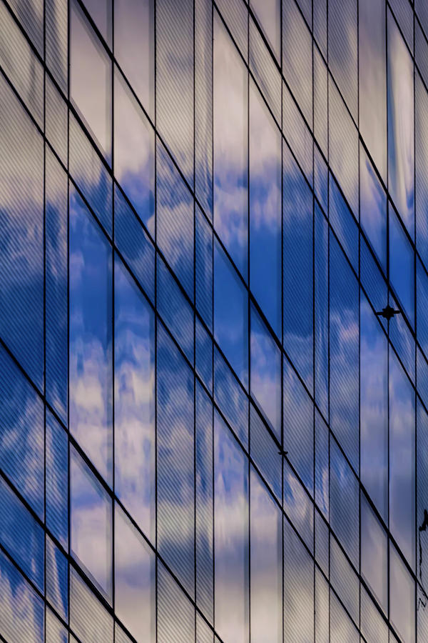 Clouds Reflected in Glass Windows Photograph by Robert Ullmann