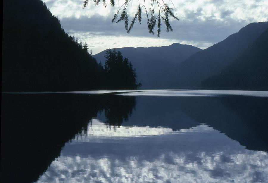 Clouds Reflecting On The Mountain Lake  Photograph by Lyle Crump