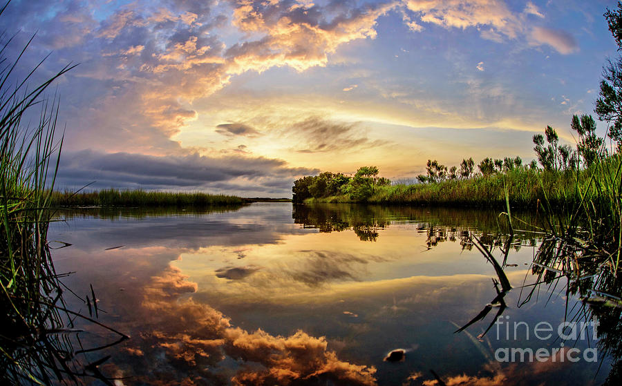 Clouds Reflections Photograph by DJA Images