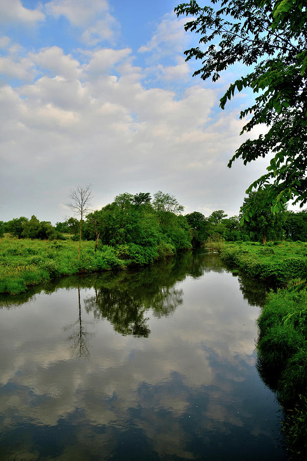 Clouds Roll In Over Nippersink Creek in Glacial Park Photograph by Ray Mathis