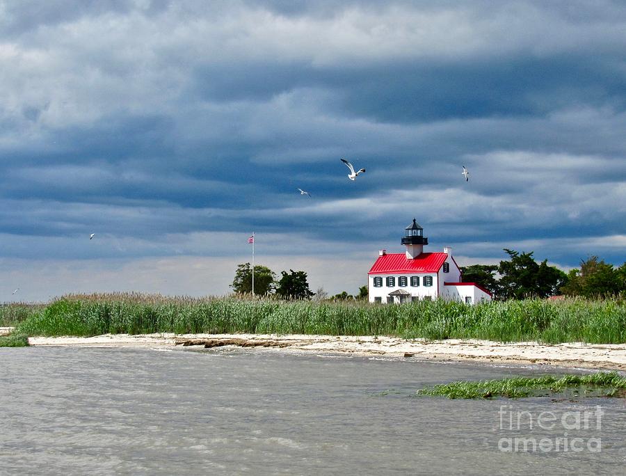 Clouds Rolling in Over East Point Light Photograph by Nancy Patterson