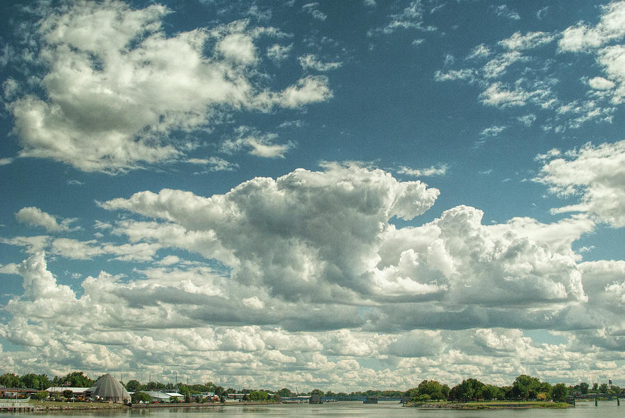 Cloudy Blue Skies over the St. Clair River in Port Huron Michigan Photograph by Randall Nyhof