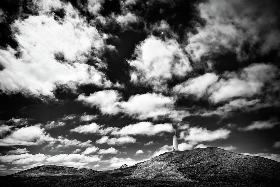 Cloudy sky and lighthouse Reykjanesviti Iceland Photograph by Matthias Hauser