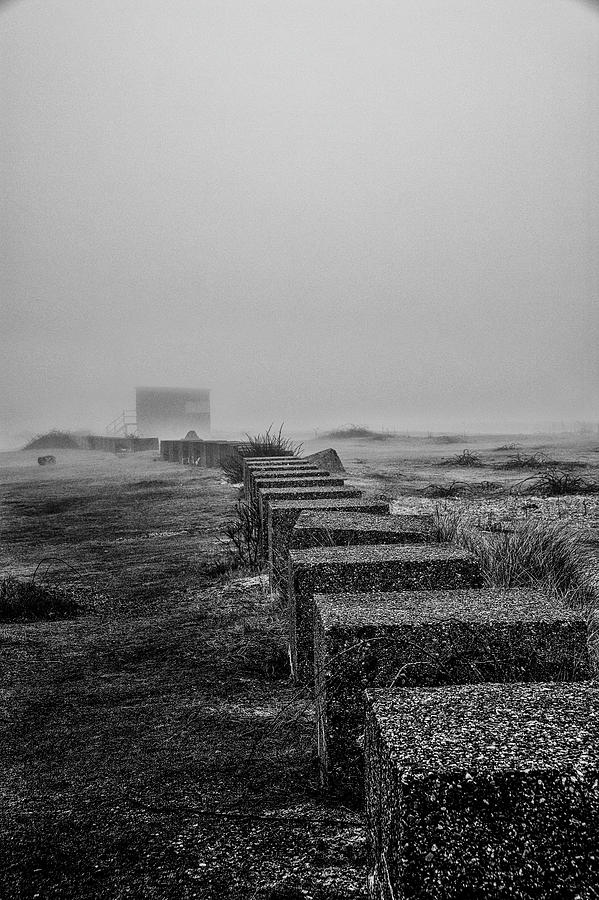 Coastal Defence. Anti tank cubes line the beach at Landguard near ...