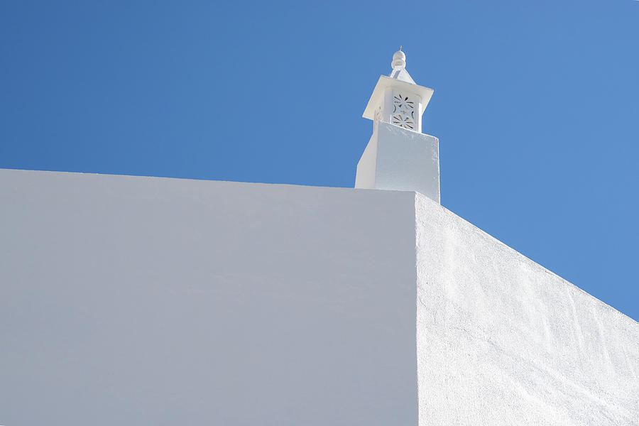Cobalt Blue and White - Signature Algarve Chimney Against Fair Sky Photograph by Georgia Mizuleva