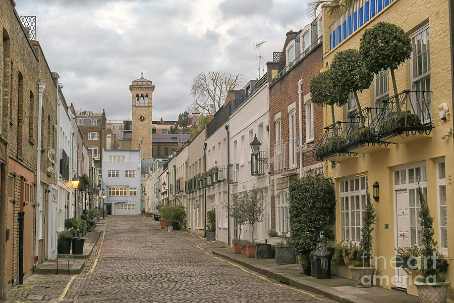 cobblestoned street in the Mews in London Kensington Photograph by Patricia Hofmeester